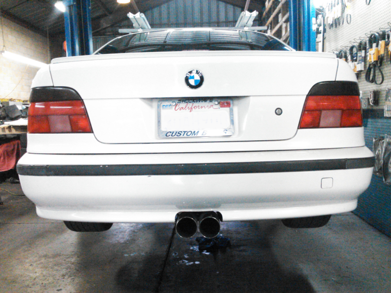 Illustration for article titled When you really, truly have to have a center exhaust on your E39
